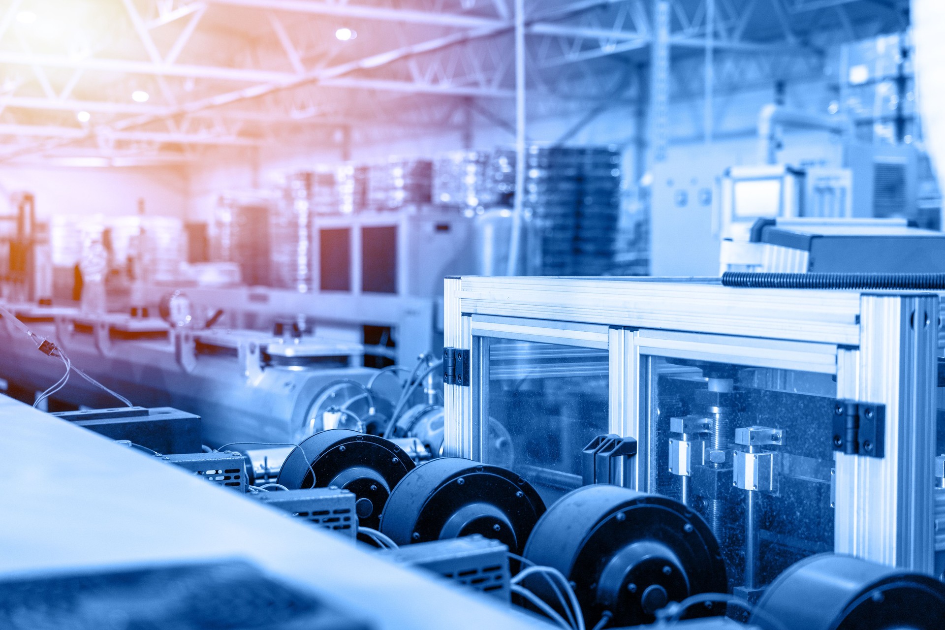 Automated industrial production line with modern machinery, conveyor system and high precision equipment for manufacturing, packaging, engineering and Industry 4.0 solutions